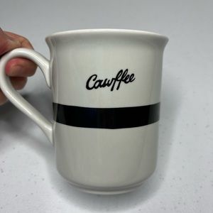 Fishs Eddy Cawffee coffee mug. Condition is pre-owned- no chips or cracks.